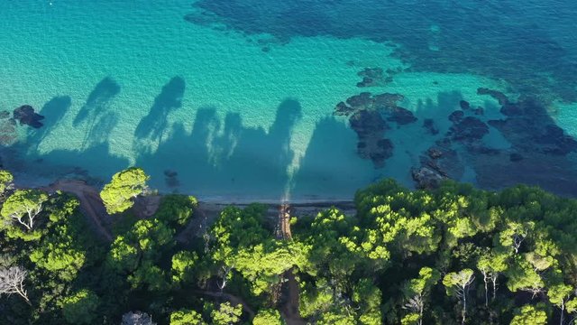 French riviera Porquerolles Hy&egrave;res aerial top shot white sand beach Courtade green pine trees