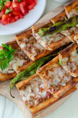 Turkish Pita(pide) with minced meat and cheese.