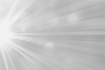 Abstract white gray blurred radiant sunrise banner background