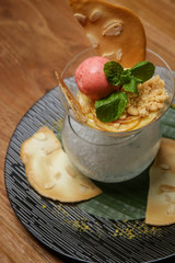Apple crumble in a glass on ice. Creative restaurant dessert concept. Haute couture food. Fine dining concept.