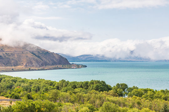 Western Asia, Eurasia, South Caucasus, Republic of Armenia. Sevan. View across Lake Sevan from the Sevanavank Monastery complex.