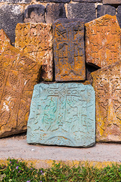 Western Asia, Eurasia, South Caucasus, Republic of Armenia. Sevan. Carved stone tablets outside of the church of Surp Arakelots at the Sevanavank Monastery complex on Lake Sevan.