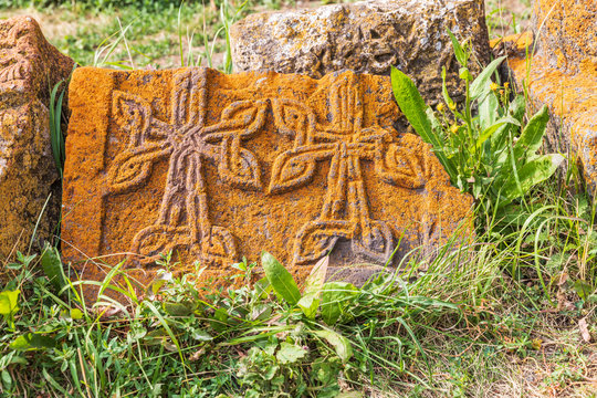 Western Asia, Eurasia, South Caucasus, Republic of Armenia. Sevan. Carved stone tablets outside of the church of Surp Arakelots at the Sevanavank Monastery complex on Lake Sevan.