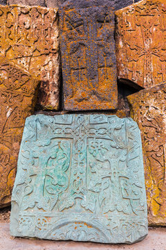Western Asia, Eurasia, South Caucasus, Republic of Armenia. Sevan. Carved stone tablets outside of the church of Surp Arakelots at the Sevanavank Monastery complex on Lake Sevan.