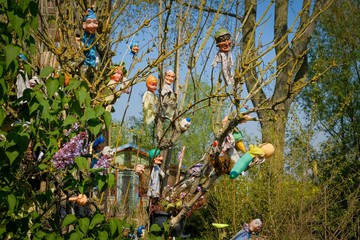 Hanged puppets fly on the wind and attracts tourists to the souvenir market