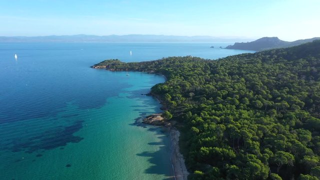Porquerolles Island aerial view beautiful beach cap medes and France in background sunny day 