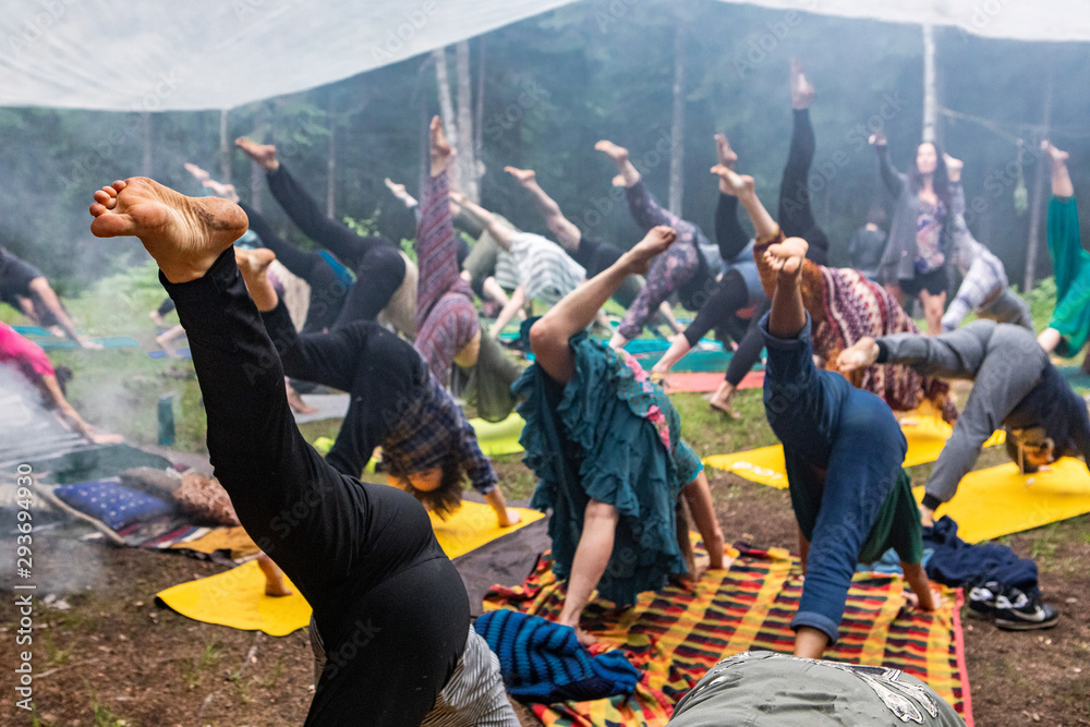 Wall mural diverse people enjoy spiritual gathering an intergenerational group of people wearing colorful cloth