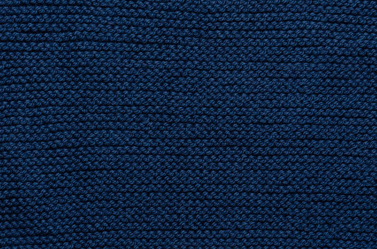 Blue knitted handmade wool texture abstract background