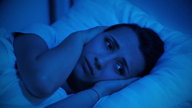 Woman cannot fall asleep due to noisy neighbors