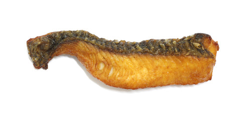 Slice of fried dried fish on white background