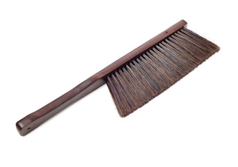 Broom on the white background