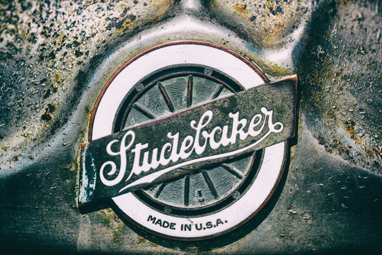 The emblem on the front of a classic Studebaker automobile. 
