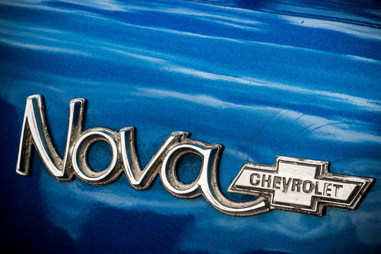 Nameplate of classic blue Chevrolet Nova.