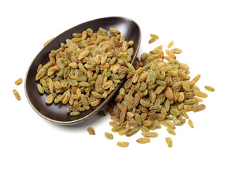 Raisins on white background