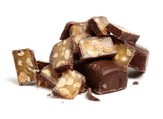 Chocolate peanut candy on white background