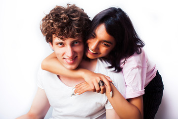 best friends teenage girl and boy together having fun, posing emotional on white background, couple happy smiling, lifestyle people concept, blond and brunette multi nations closeup