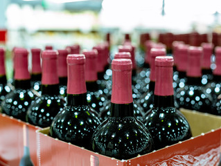 Red Wine bottles in the wine store.