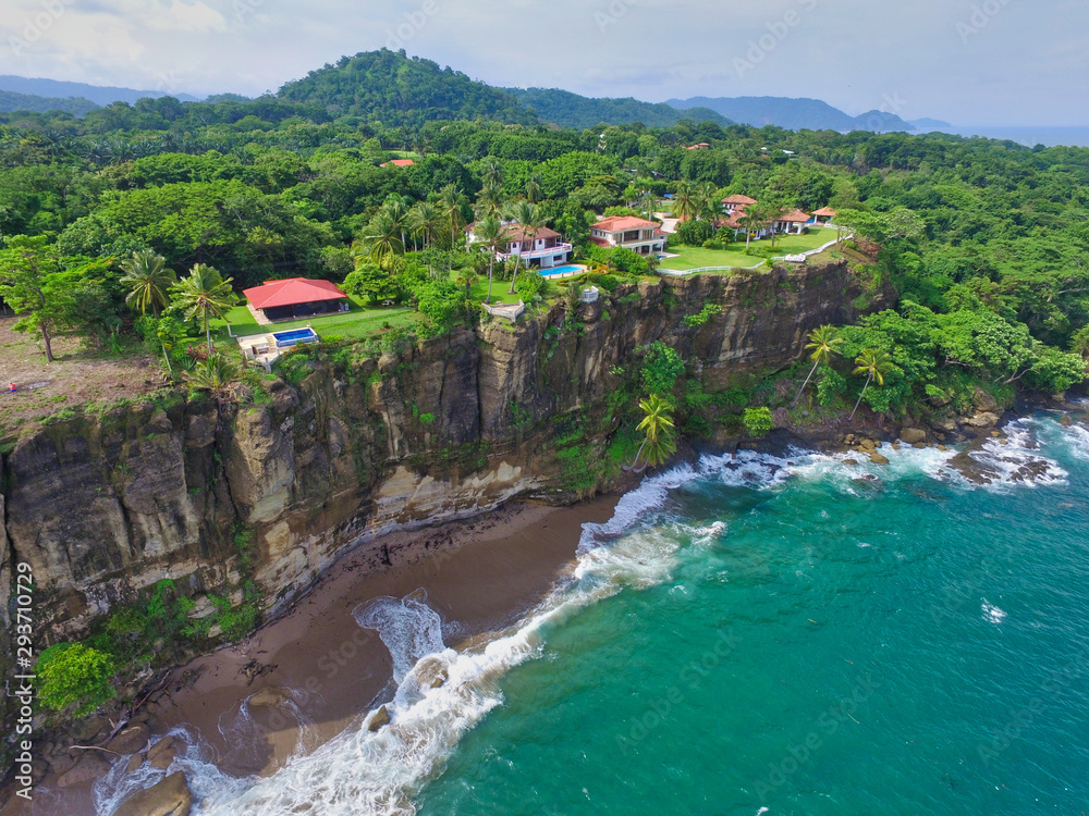 Wall mural luxury ocean view homes on a cliff side in tango mar, costa rica