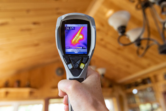 Indoor Damp & Air Quality (IAQ) Testing. Cold And Hot Spots Are Seen Close Up On The Display Of An Infrared Thermal Spot Camera During An Indoor Living Environment Quality Assessment.