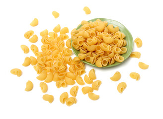 Italian pasta (Gomiti Rigati) on white background 