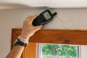 Indoor damp & air quality (IAQ) testing. A close up view of an indoor environmental quality...