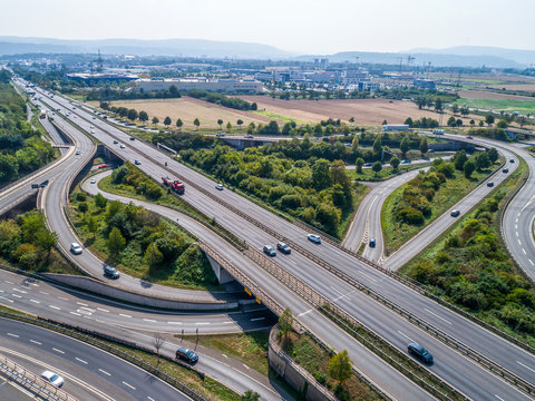 Aerial view of a highway intersection with a clover-leaf interchange Germany Koblenz