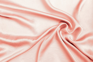 Abstract closeup shiny red waving fabric pattern background, blank red fabric texture background