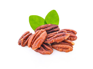 Roasted pecan nut with salt on white background