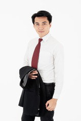 Obraz na płótnie Canvas Portrait of the handsome young Asia businessman with suit smile and standing look the camera on white background, isolated.