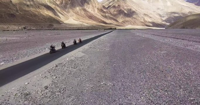 Riders on the khalsi to Nubra road.//Drone shot