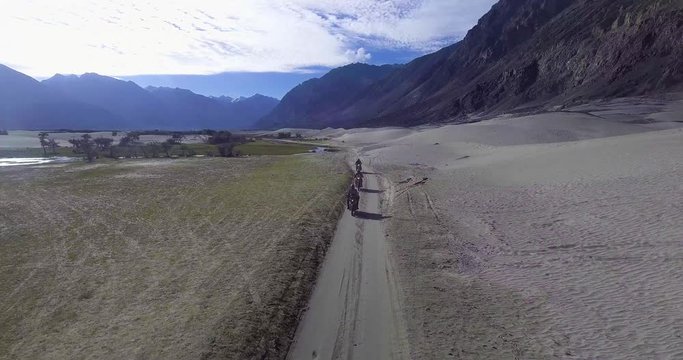 Riders entering into Nubra valley.//Drone shot