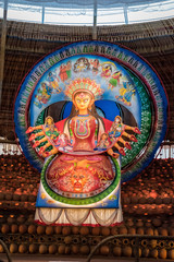 Idol of Goddess Devi Durga at a decorated puja pandal in Kolkata, West Bengal, India. Durga Puja is...