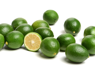 Fresh limes on white background