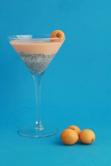 glass with chia and medlars pudding