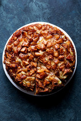 beautiful apple pie on a blue background