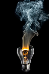 broken light bulb and smoke from a burning spiral on a black background