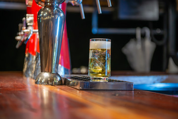 glass of beer on bar