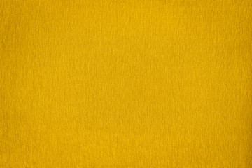 Obraz premium Texture of real yellow knitwear, textile background. Abstract background