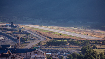 Aerial view of Mestia Valley from Hatsvali (Khatsvali) ski resort cableway. Airport of Mestia, Georgia.