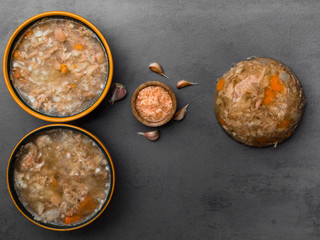 Jellied pork and beef with carrots, mustard on background