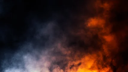 Deurstickers Abstracte blauwe en oranje rook stoom beweegt op een zwarte achtergrond. Mist textuur. © Victor