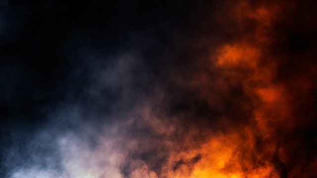 Abstract blue and orange smoke steam moves on a black background . Fog texture.