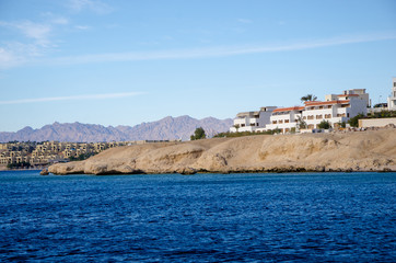 View of the coast with the buildings of the Sinai Peninsula of the Red Sea in Sharm el Sheikh (Egypt)