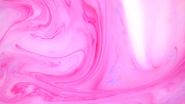 Stains of pink and white ink on the water. Abstract colored background, psychedelic footage. Fluid design for motion graphics.