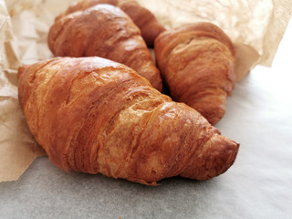 Croissants on a bakery bag. French pastry.