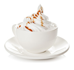 Cup of coffee with whipped cream on white background