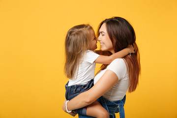 Woman in light clothes have fun with cute child baby girl 4-5 years old. Mommy little kid daughter...