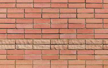 Red bricks in the wall of the house