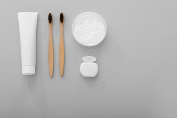 Set for dental hygiene on grey background