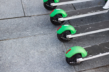 Obraz premium Electric Scooters used for transportation around the cities. Quick and easy way to travel. Transport scooter in Europe.